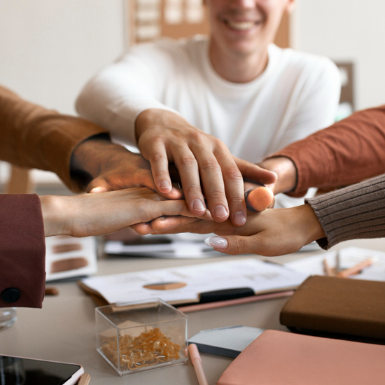 Hands together, working as a team